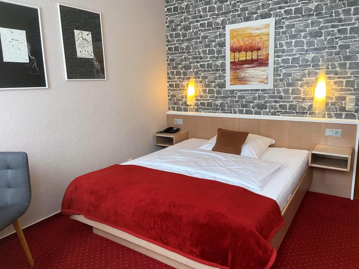 Hotel Stadt Hamburg Am Fluss Sarrebruck Extérieur photo