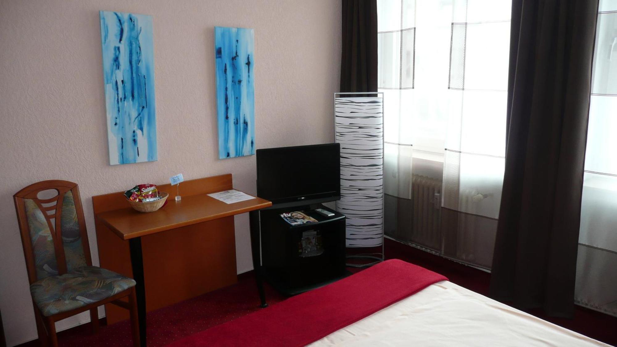 Hotel Stadt Hamburg Am Fluss Sarrebruck Chambre photo
